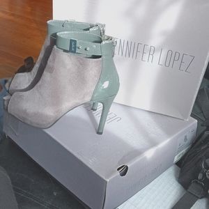 Fabulous all gray heeled slightly open toed booties